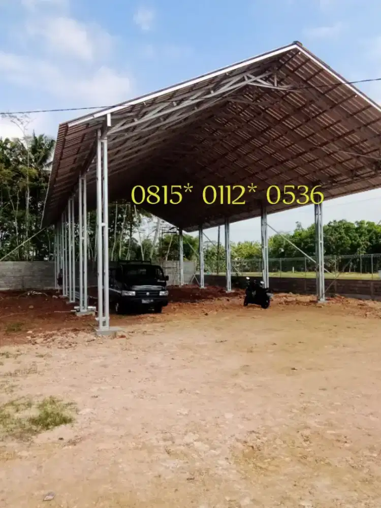 Baja ringan terpasang atap gudang parkiran