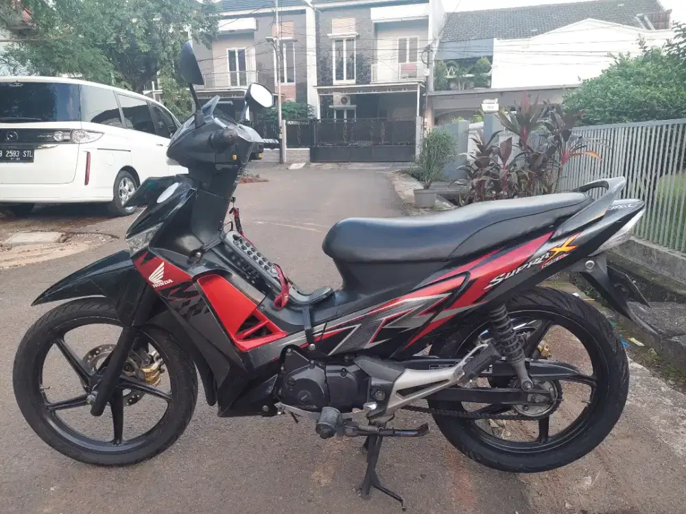 menerima supra x 125 karbu 2011 tua muda