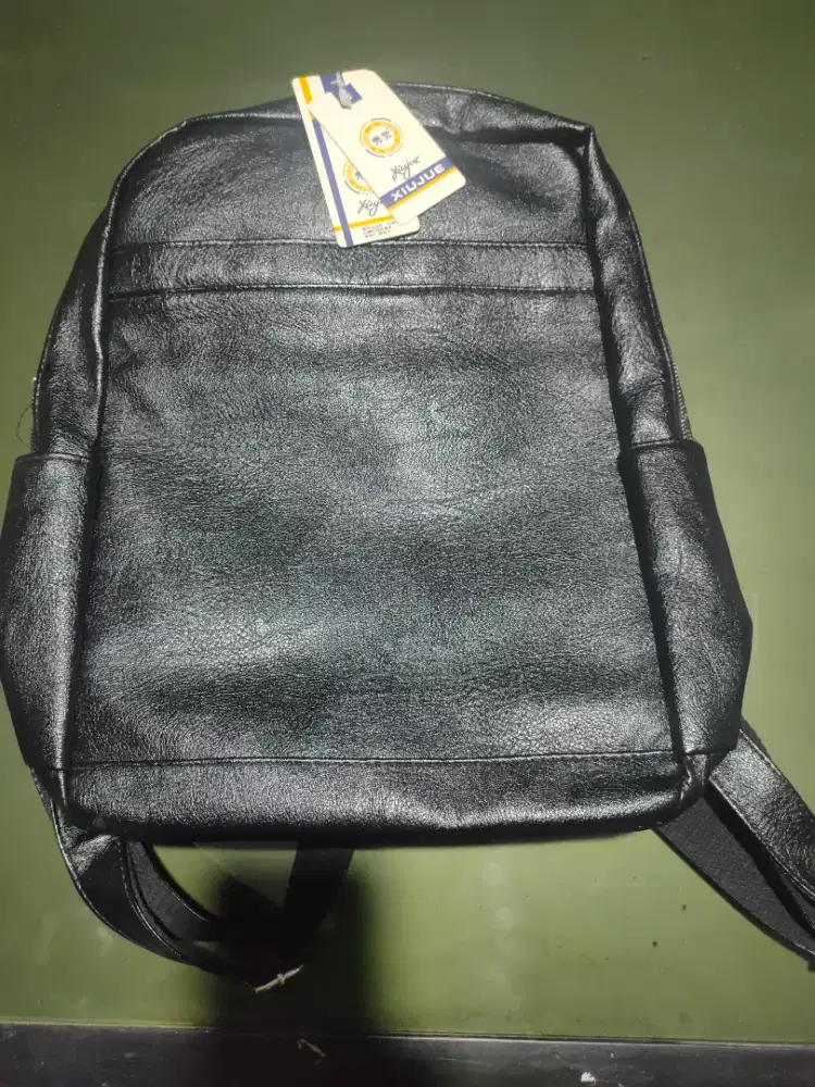 Tas semi kulit produk impor