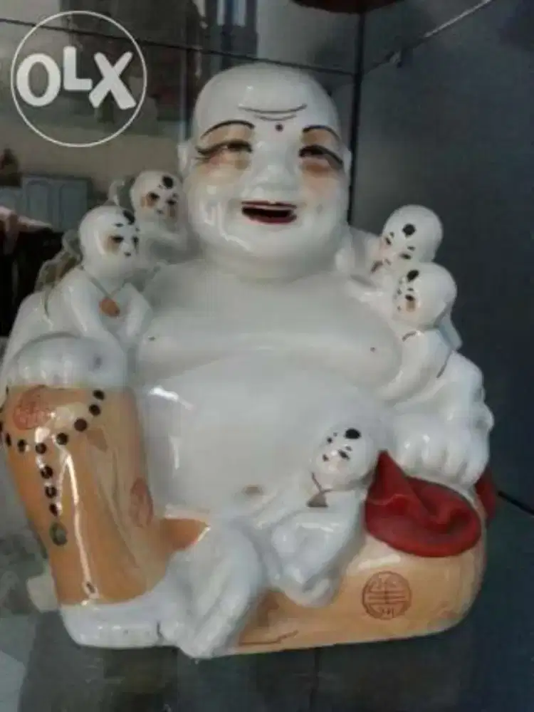 Patung Buddha Maitreya Duduk keramik. HARGA OBRAL