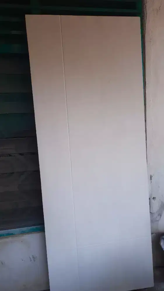 Pintu triplek perum subsidi