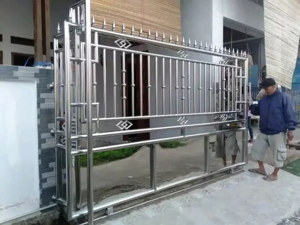 Pemasangan/perbaikan pagar, canopy,Balcon, relling tangga,folding gate