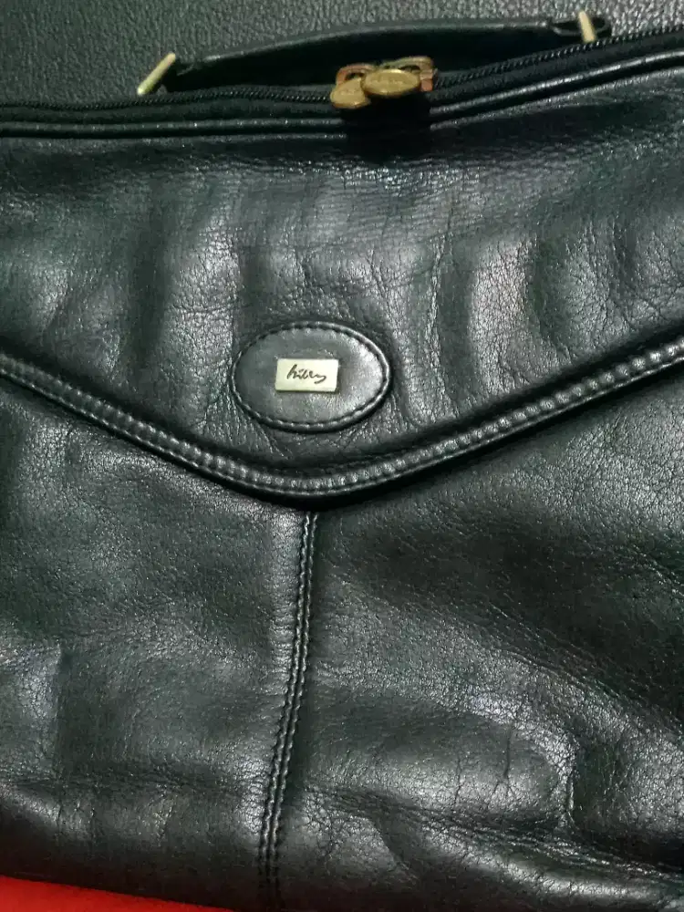Tas kulit, Hilly lebar 33 tinggi 22, 15 slot..