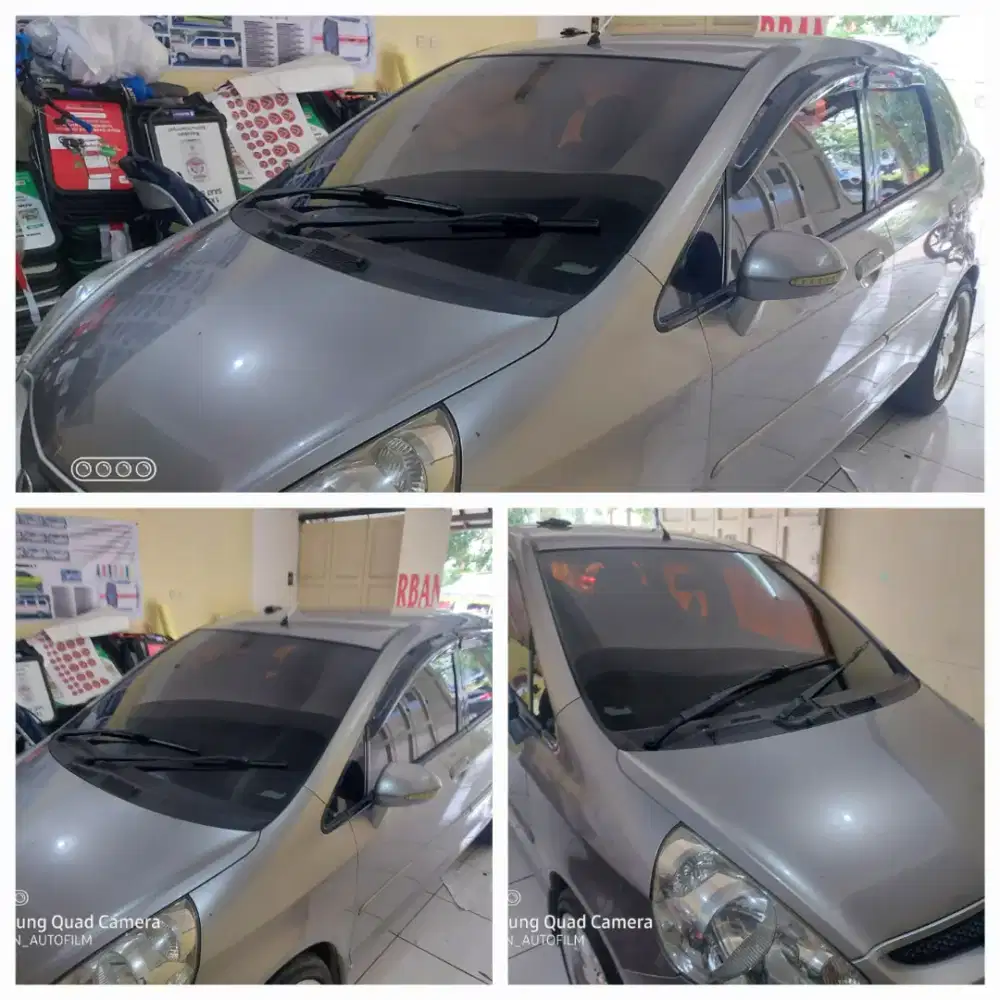teknisi pasang kaca film mobil