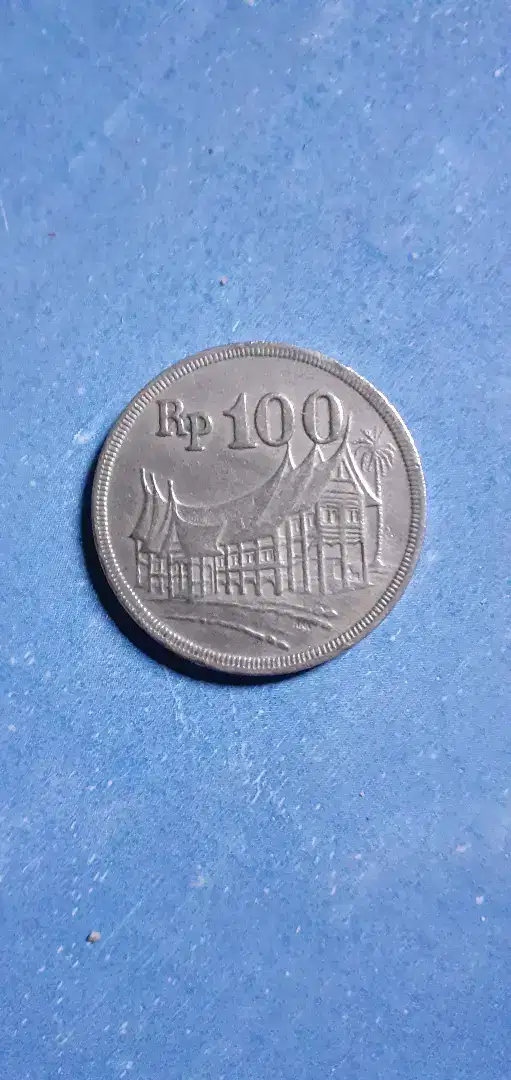 Uang koin kuno Rp 100 Rumah adat th 1973