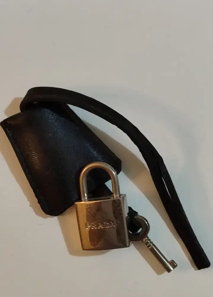 Prada padlock original with pocket.