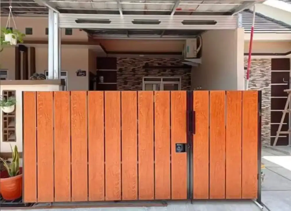 Pagar besi motif kayu