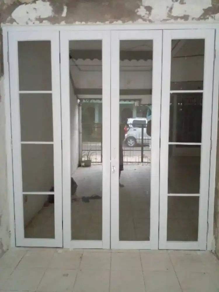 Tukang kusen aluminium