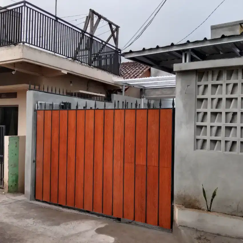 Pagar grc motif kayu