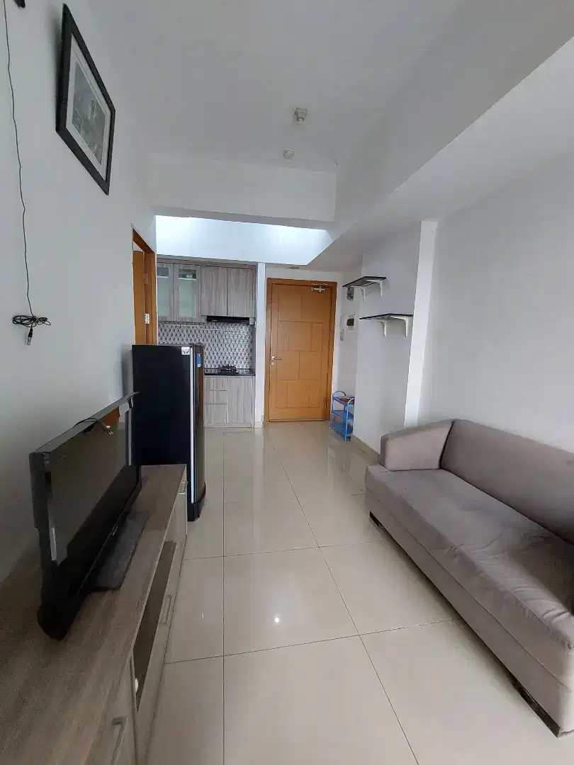 Disewakan termurah 2BR Furnish Tahunan Apartement The Nest