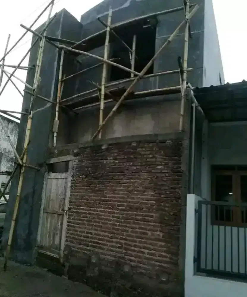 Tukang bangunan berpengalaman