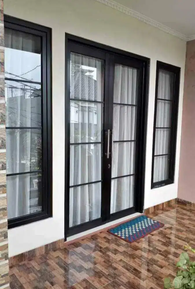 KUSEN DAN PINTU ALUMINIUM DOBEL PINTU DAN JENDELA