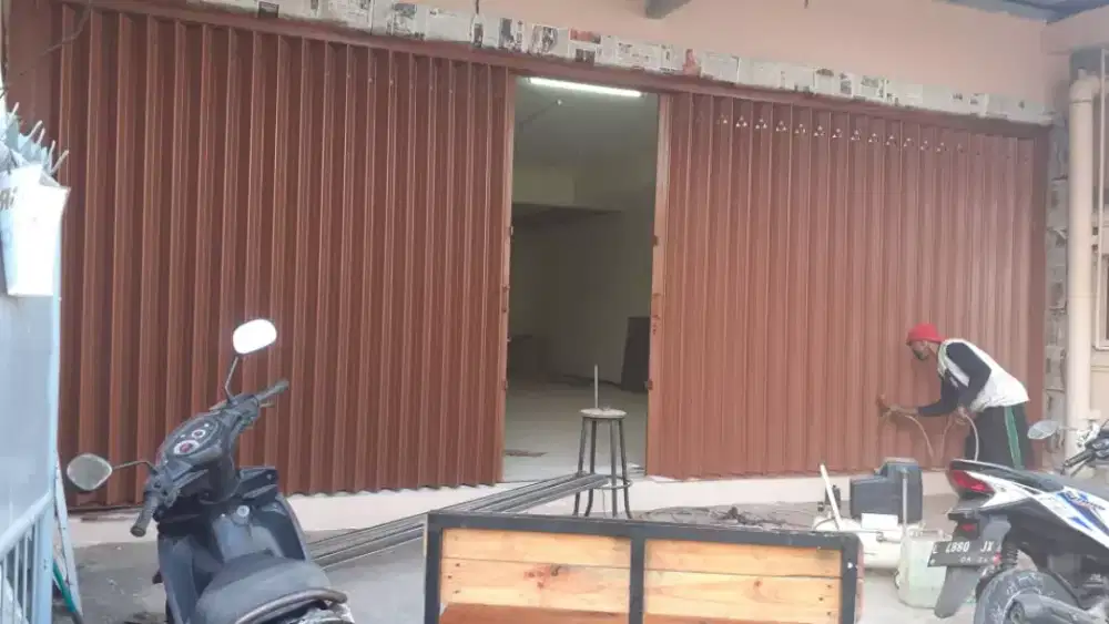 SERVICE PINTU HARMONIKA 77 SBY