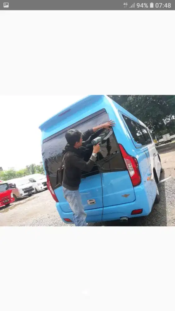 Kaca film untuk privasi dan tolak panas