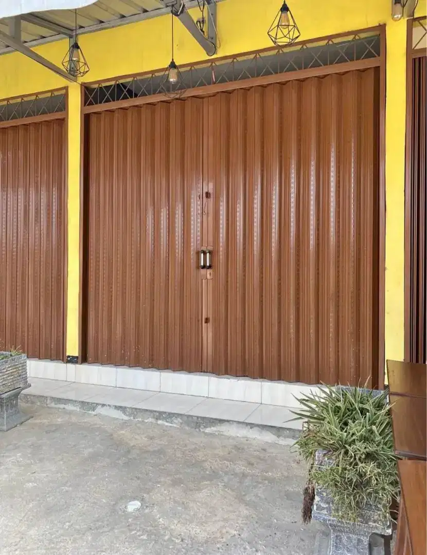 Pintu folding gate rolling door dll