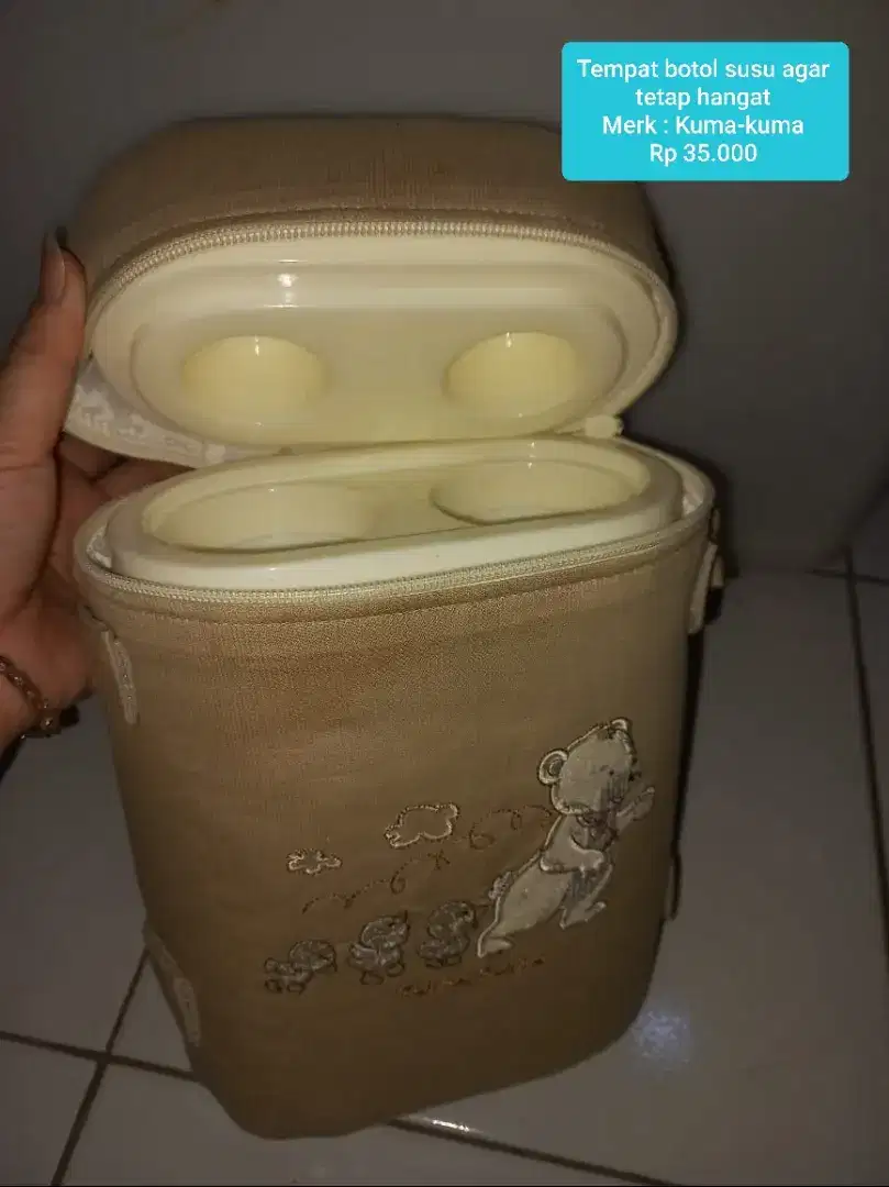 Tempat botol susu agar tetap hangat