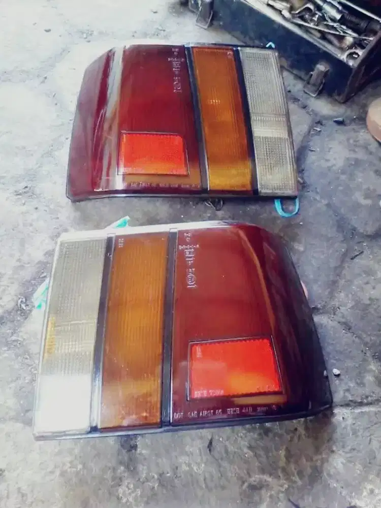 Headlamp stoplamp spion original holden geminii 89-90