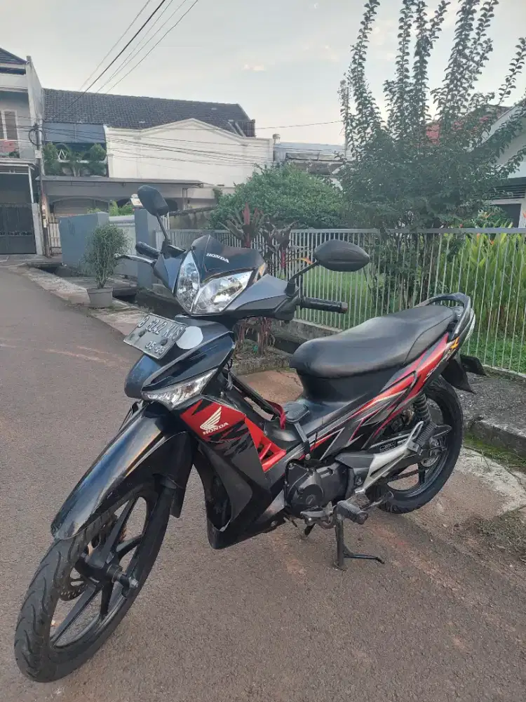 menerima supra x 125 karbu 2011 tua muda