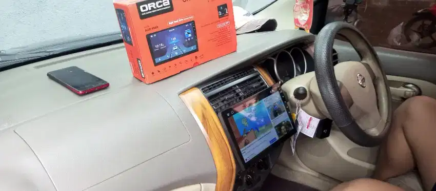 Pemasangan head unit android orca 9 inc di grand Livina