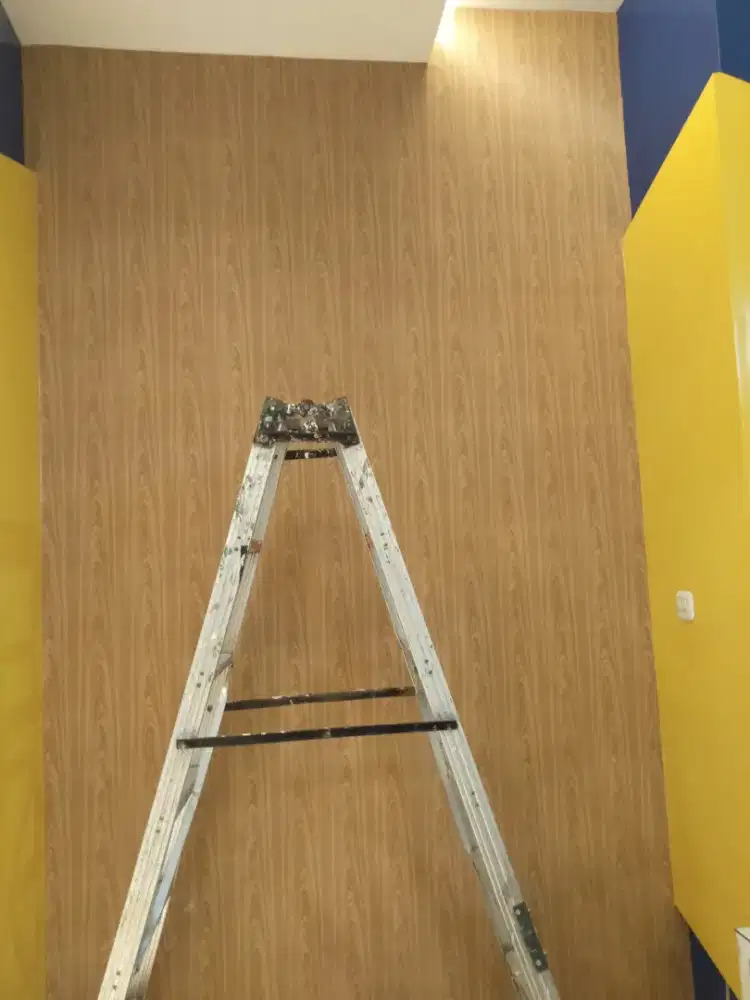 Tukang pasang wallpaper setiker