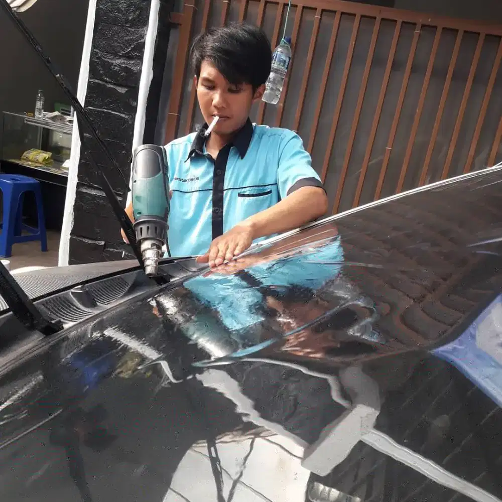 Kaca film tolak panas matahari