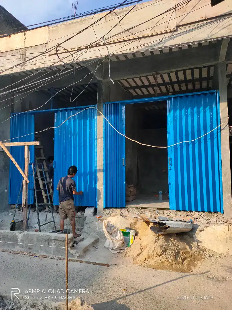 Roling door folding gate