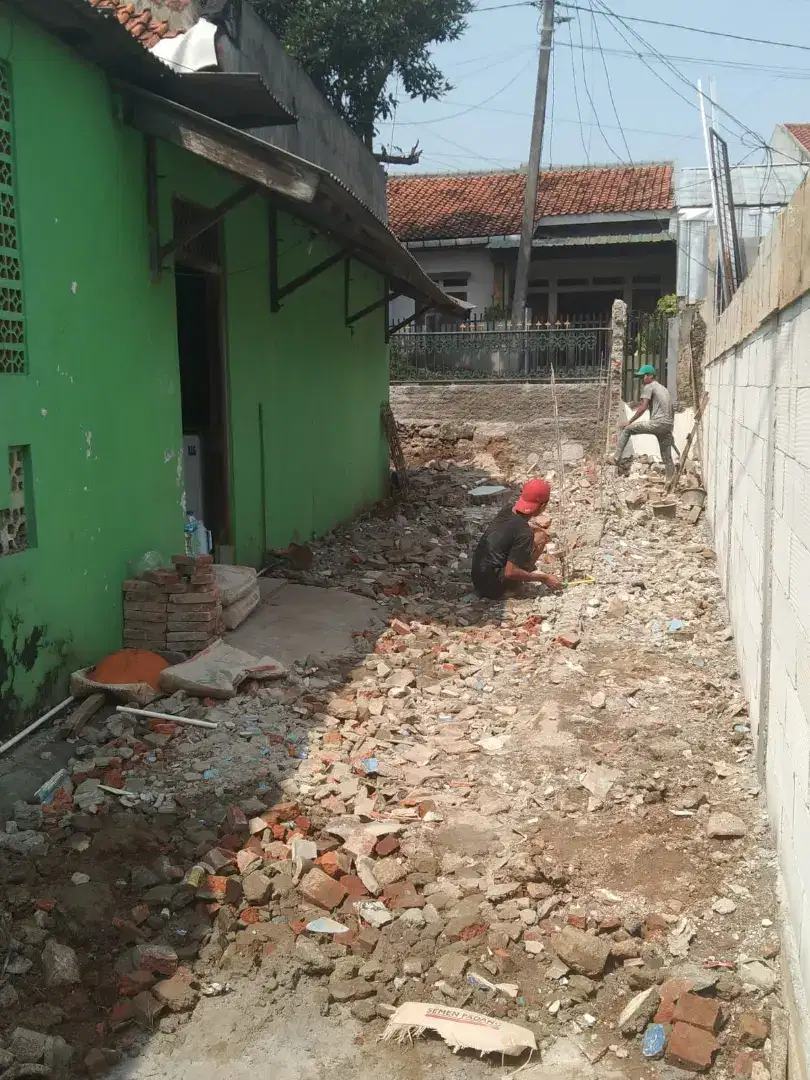 Pengurug buang puing sampah gali taman puing tanah campur