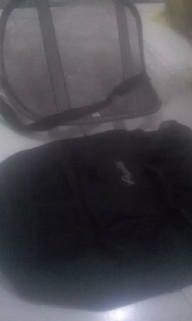 Sandaran dan kantung organizer jok mobil