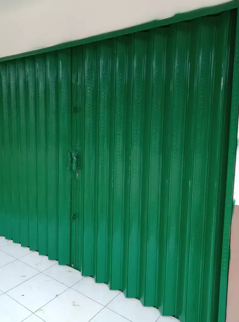 Folding gate rolling door