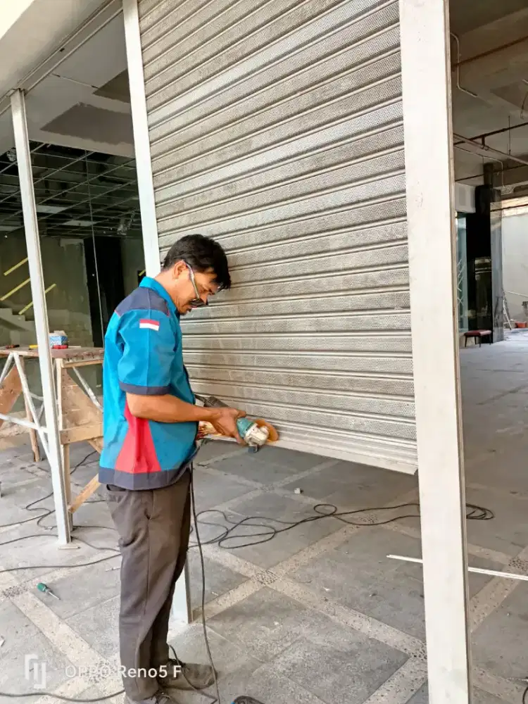 Service rolling door bekasi