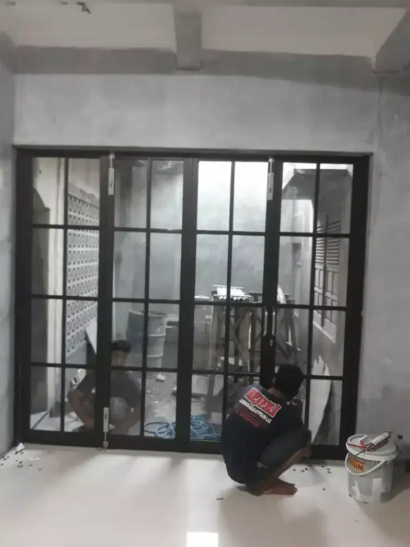 Pintu lipat aluminium kaca pusatnya murah