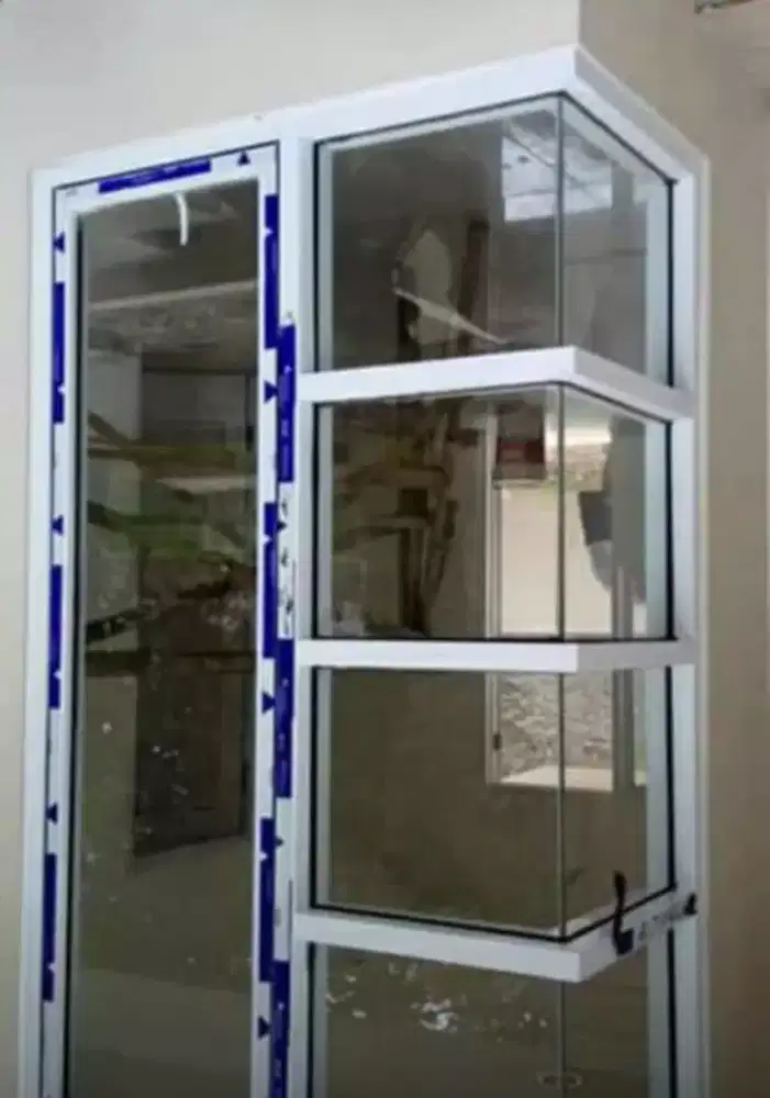 mengerjakan kusen alumunium pintu panrel jendela dll