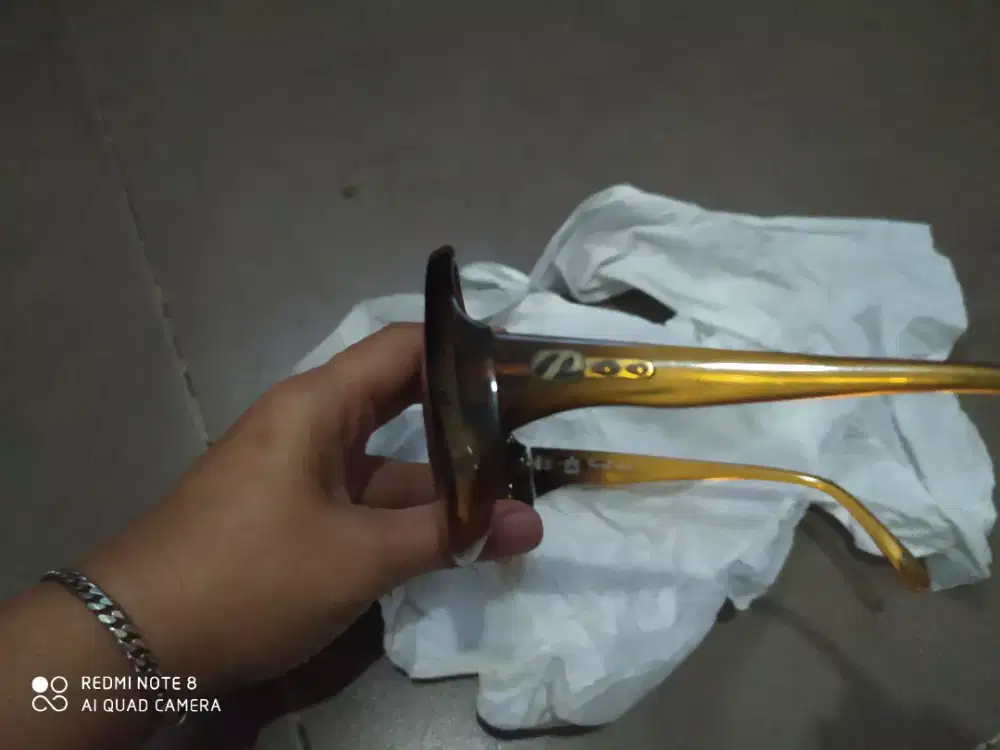 Kacamata persol retti