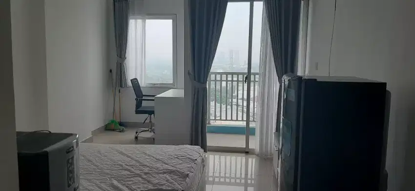 Sewa termurah furnish studio 6 bulan di apartement THE NEST puri
