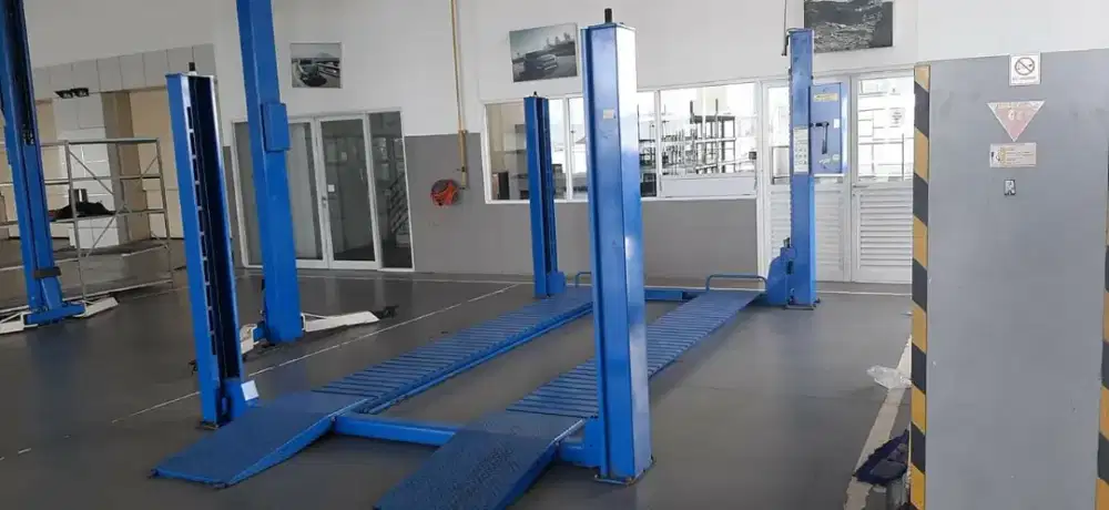 Four Post Lift Parkir  rekondisi Full Garansi