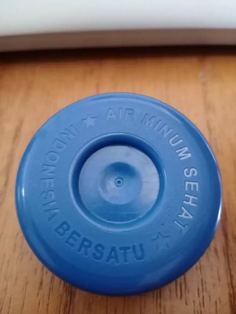 Tutup galon warna biru dongker bahan elastis