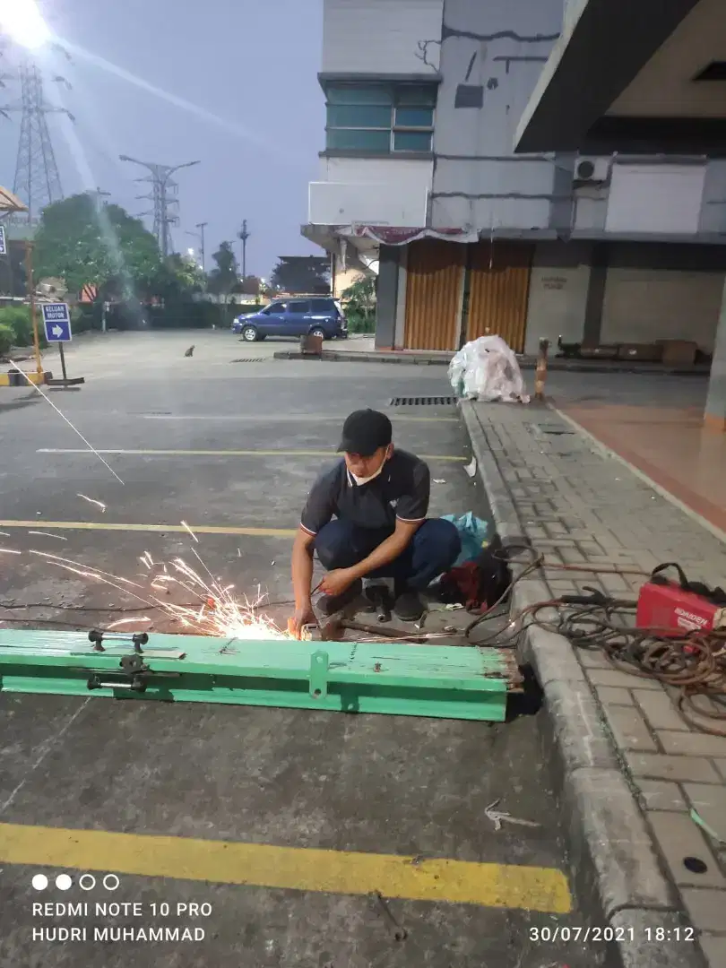 Service rolling door cikarang