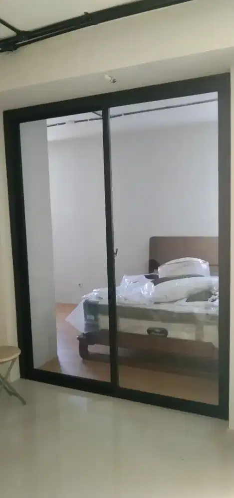 Pintu sliding dobel rell bawah