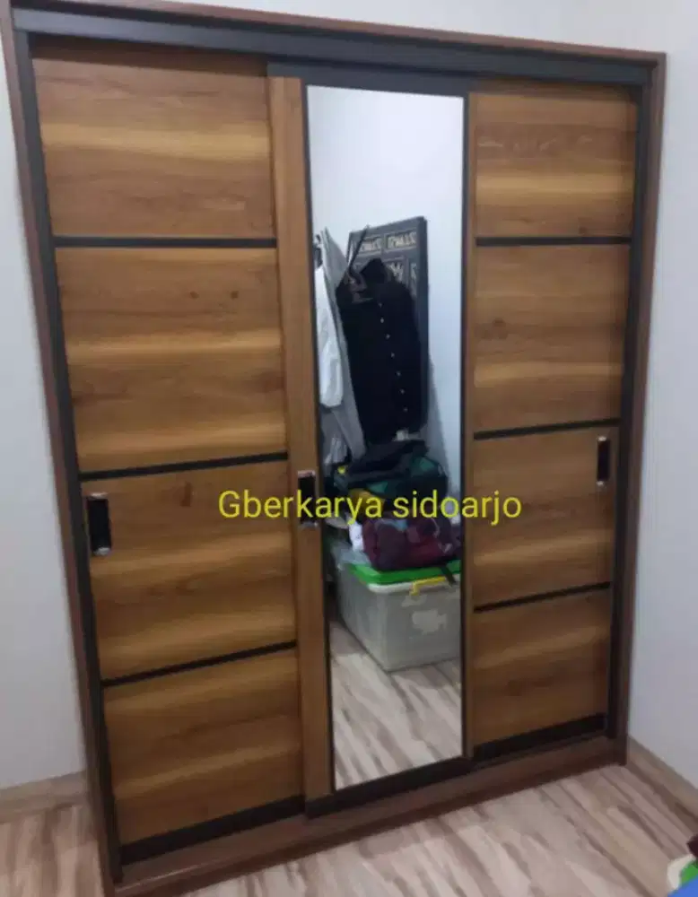Lemari pakaian sleding hpl custum