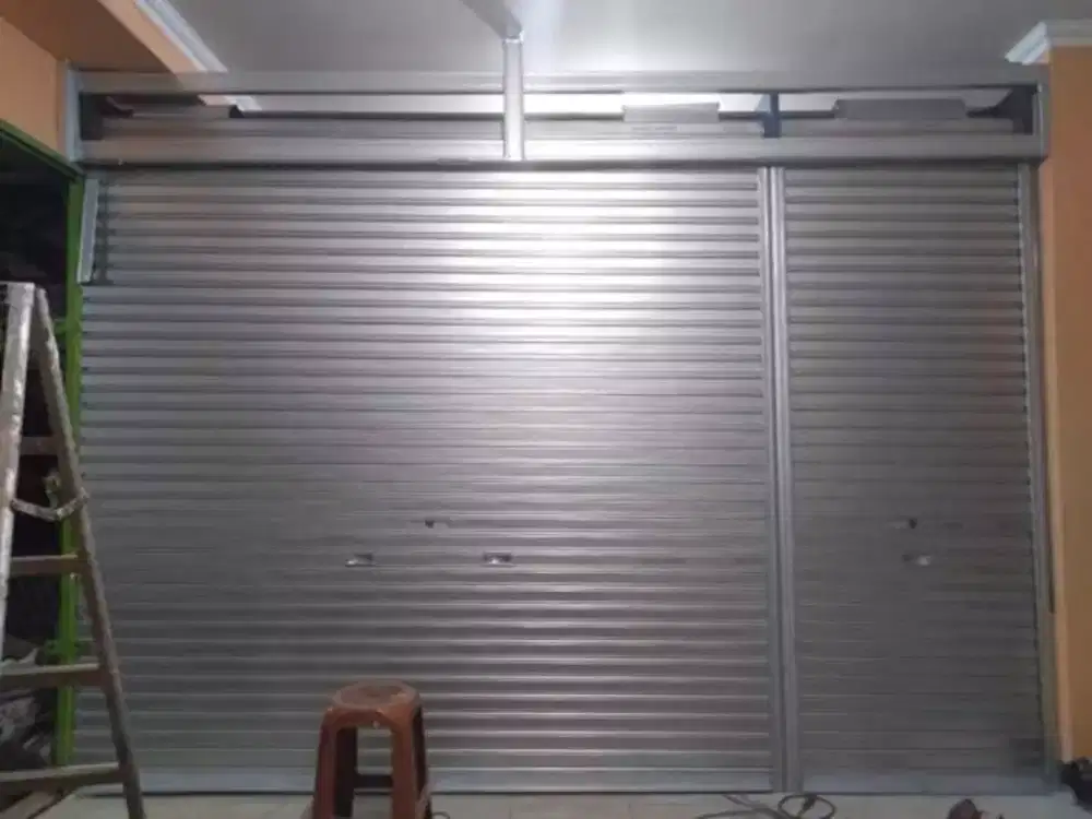 Rolling door dan folding gate besi