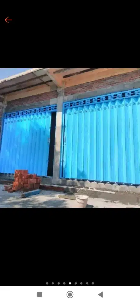 Folding gate roling door