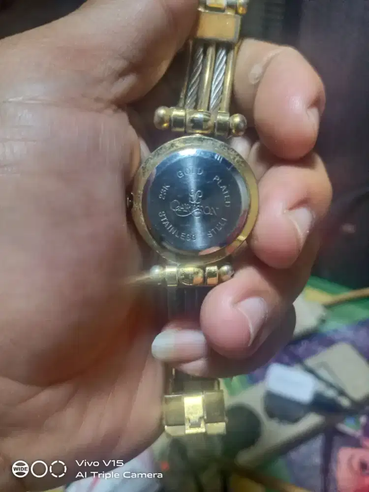 Carlton 23k gold