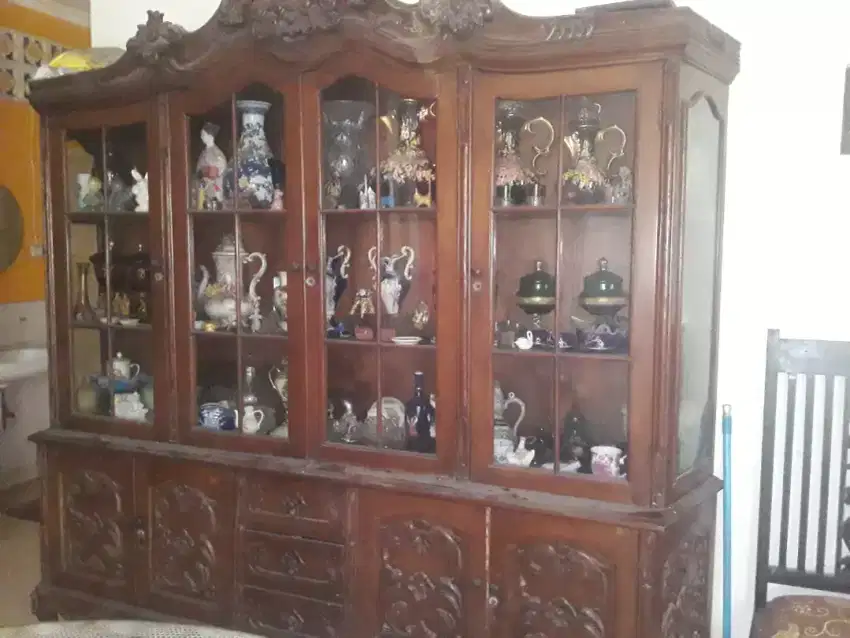 High End Teakwood Display Cabinet with a Collection of Souvenirs