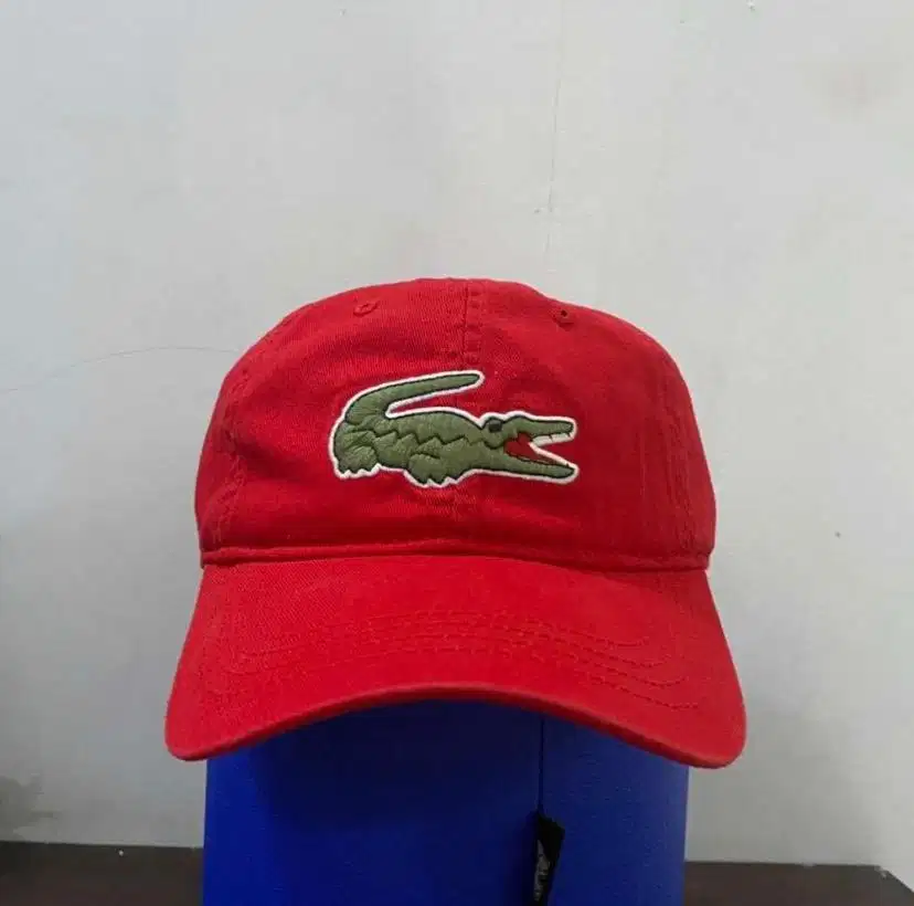 Topi Lacoste Iedul adha