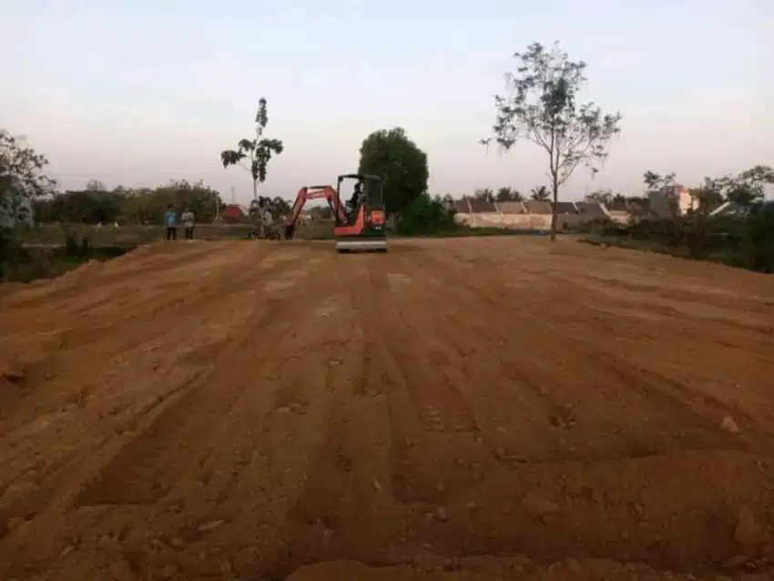 Tanah Urug Rata Padat