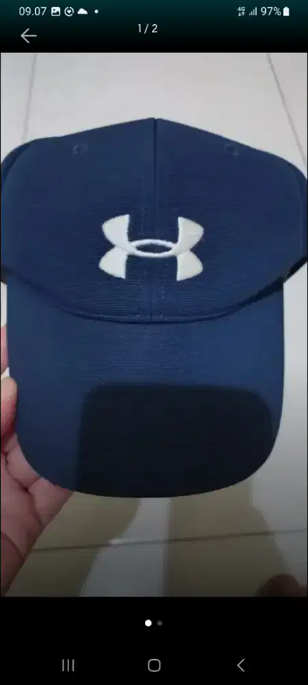 Harga topi best sale under armour