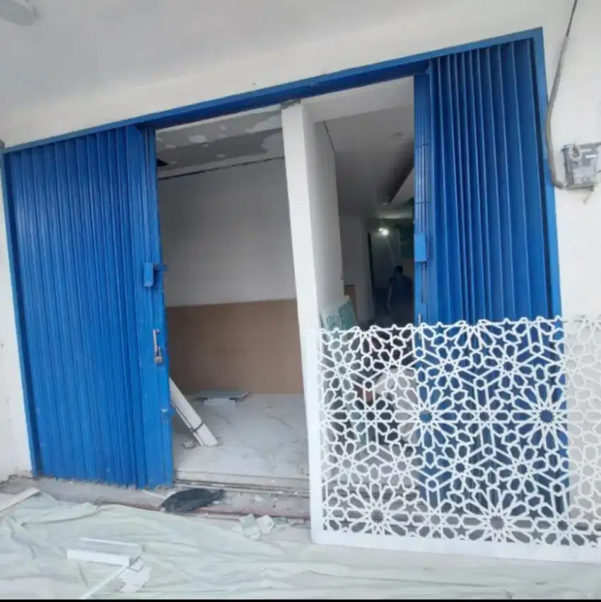 Perbaikan pintu Rolling door murah