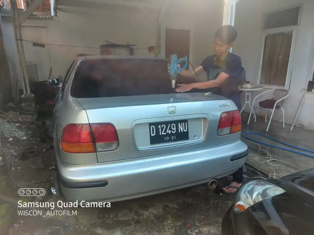 tolak panas dengan kaca film mobil