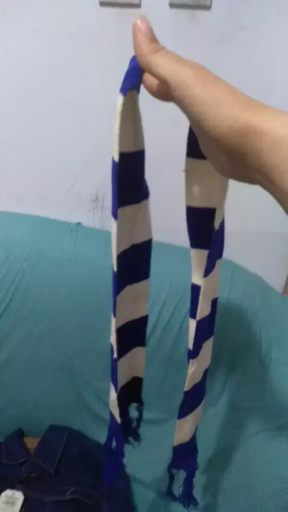 syal untuk pemain bola