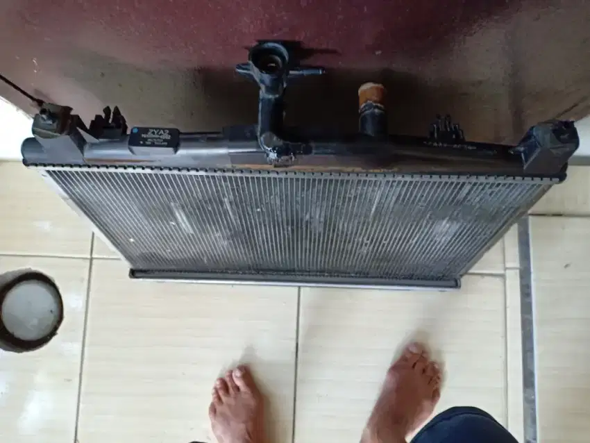 Radiator mazda 2 kondisi msh siap pakai